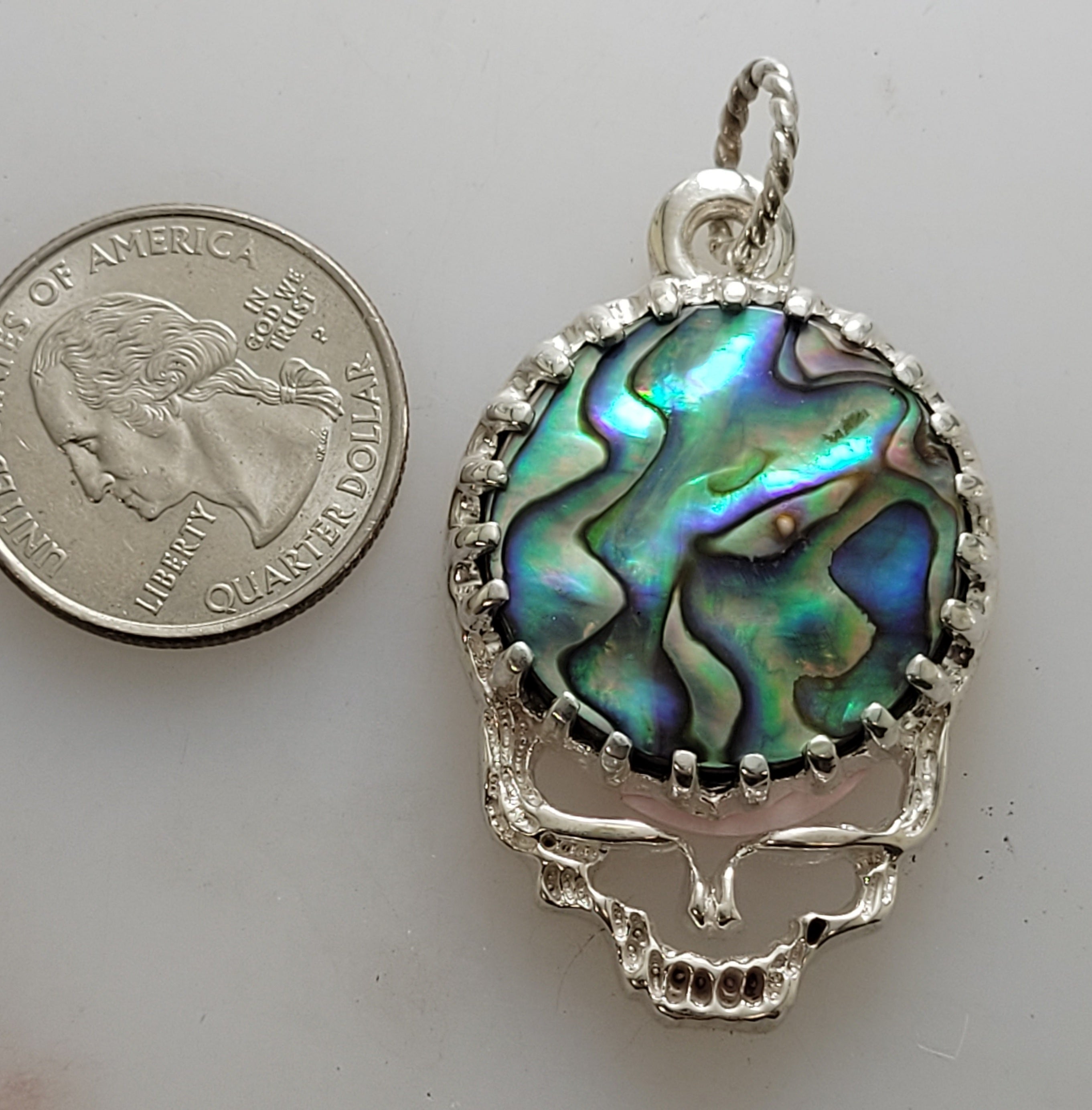 An abalone Gem Stealie pendant in sterling silver