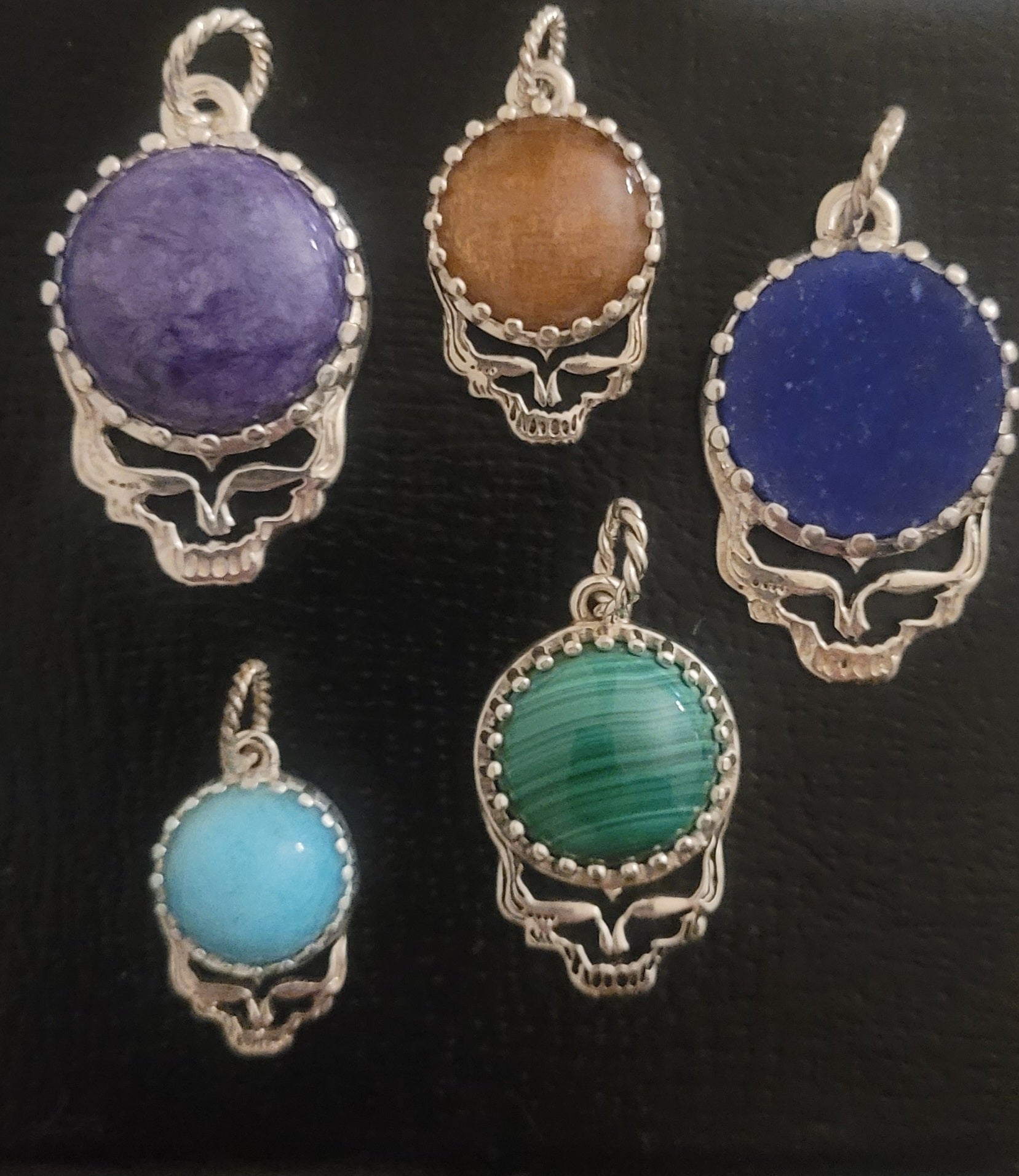 Sterling silver GemStealie pendants set with gemstones